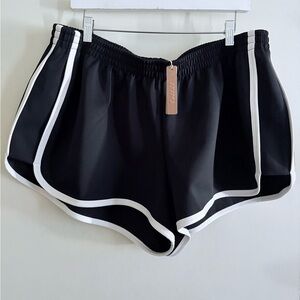 SKIMS Black Athletic Shorts with White Piping